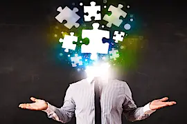 Puzzlestücke ergeben ein Gesicht. Ganz ähnlich erkennt der Astrologe aus vielen Horoskopdetails das Gesamtbild vom Menschen.